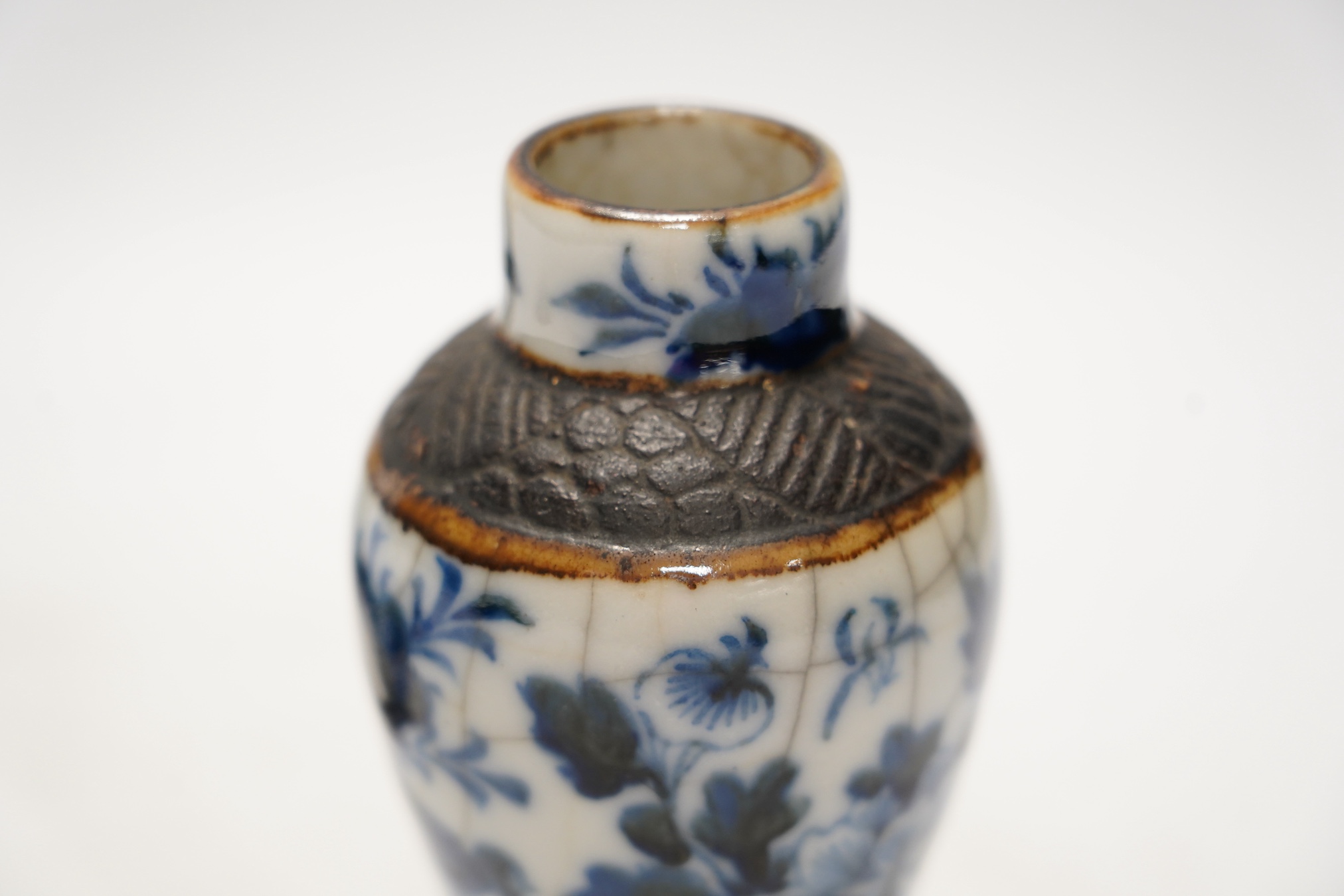 Chinese blue and white ceramics comprising crackle glaze vases and circular seal pots (4). Condition - fair to good, a few minor chips